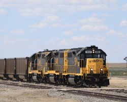 Through Stuart, where somebody (presumably CXR) is building a huge new grain dump facility. And yes, another windmill, because I like windmills.