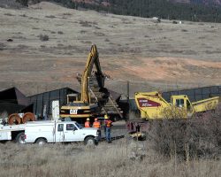 Just a little more! Pulling over a derailed, but upright, car...