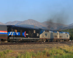 Highball Fraser! The Moffat Tunnel is just ahead. By the time the train pops out the other side, the sun will be behind the mountains for the run down to Denver.