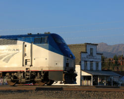 AMTK 176 and the old Fraser Mercantile Co. building