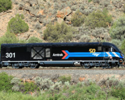 As the train is bottled up behind a freight that's taking the siding at Dell, it gave me a chance to get a number of roster shots across the river.