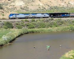 Passing some paddleboarders on the Colorado River near Dotsero
