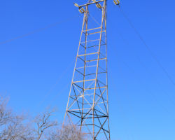 One of the towers on the line that formerly ran between Lowell and Douglas