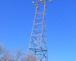 One of the towers on the line that formerly ran between Lowell and Douglas