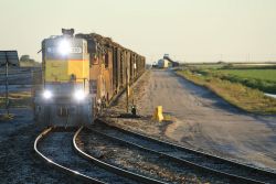 As we're turning the train on the Clewiston wye, a cane train comes in on the US Sugar line with 310 on the point