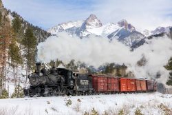Rolling south at Goblin Fire, south of Needleton, with the namesake Needle Mountains in the background. The big one in the middle is Pigeon Peak, with Turret Peak off to the right