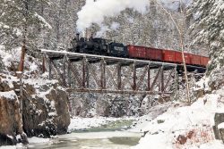 While I love the shot of RGS 20 and freight on the high bridge, it suffers from the fact that the RGS never had any big iron or steel bridges