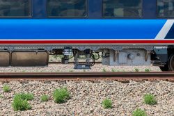 Underneath 79001. The stainless enclosure on the left appears to be the high voltage stuff for HEP and the tank on the right is wastewater. In the middle is what appears to be an antenna for Amtrak's NEC ACSES PTC system.
