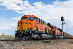Trailing DPUs BNSF 3357 and 3669 pass the (relatively) new signal at 596.6.